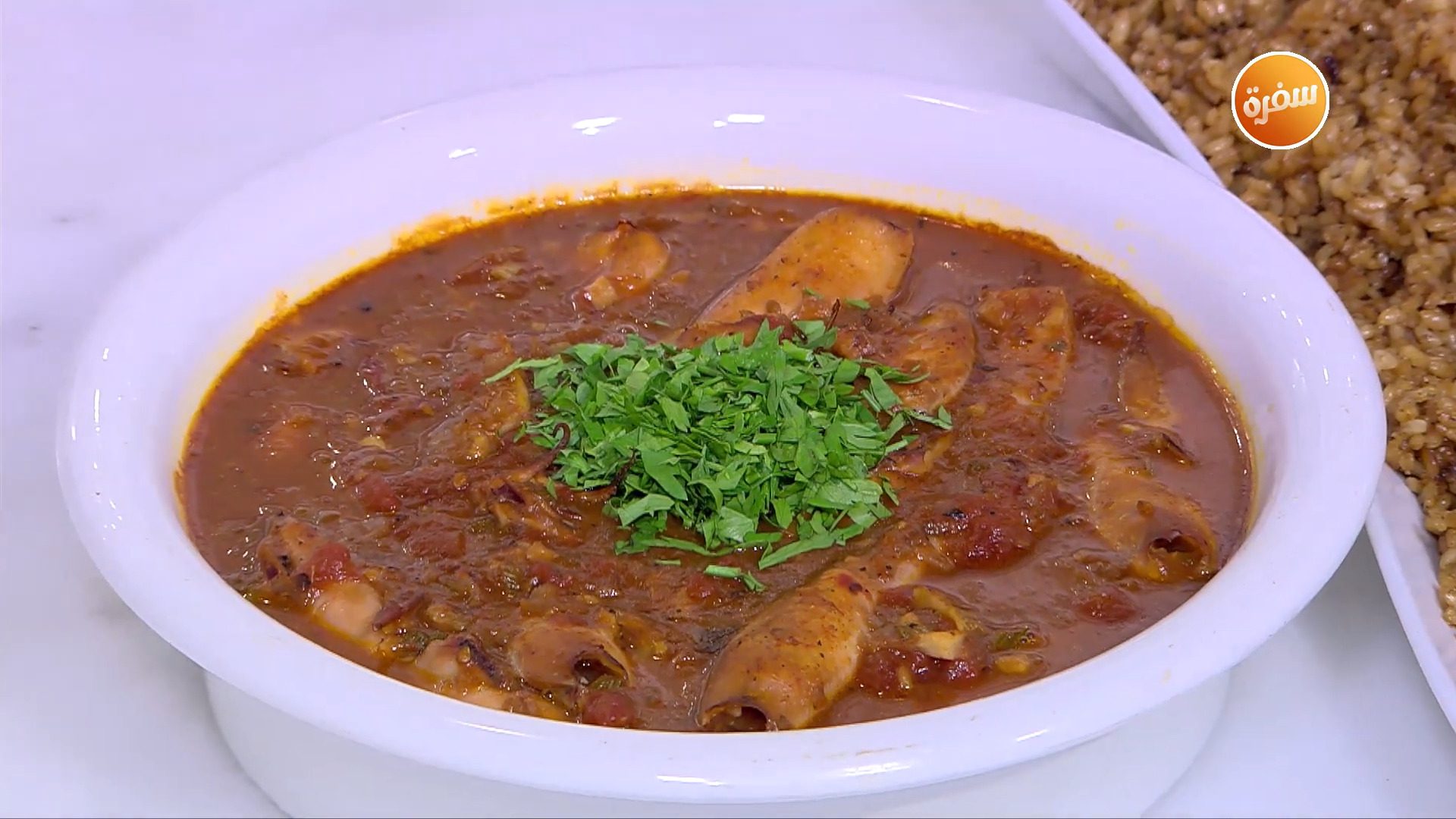 كاليماري مع الثوم والطماطم