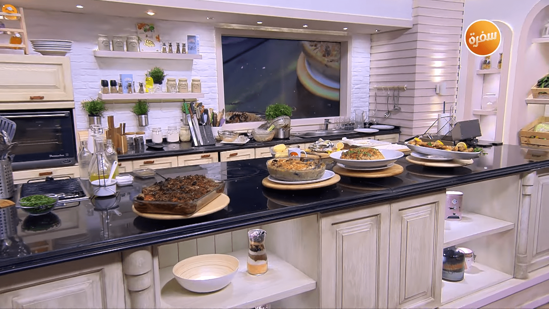 صينية سمك بلطي بالزيتون - طاجن سي فوود بالكريمة - أرز بالجمبري - بطارخ مقلية