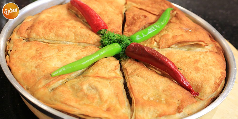 صينية رقاق باللحم والسجق