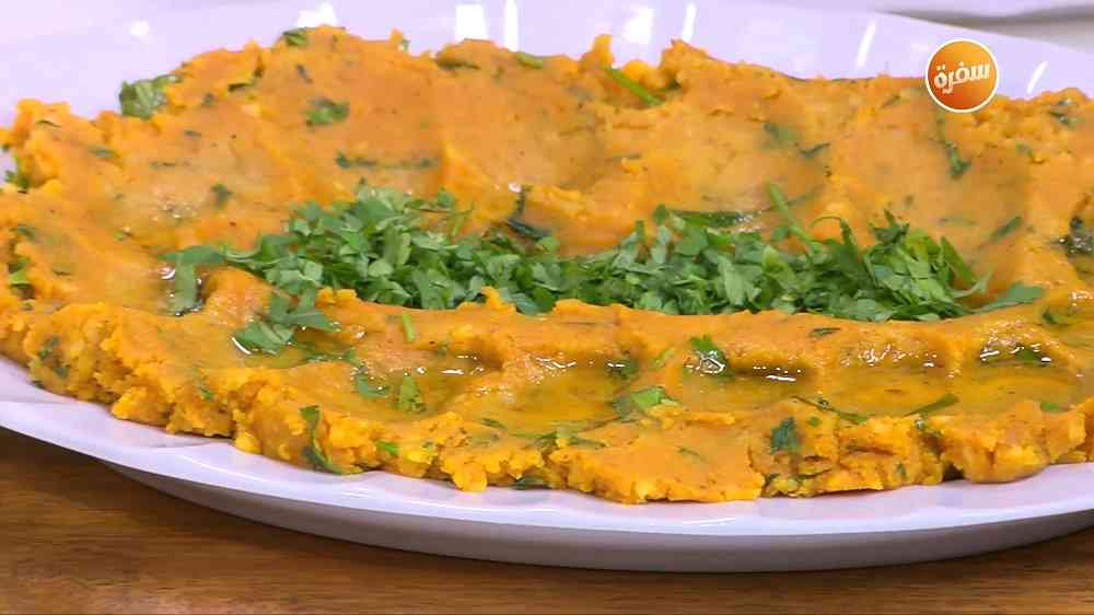 بطاطس مهروسة بالثوم والصلصة