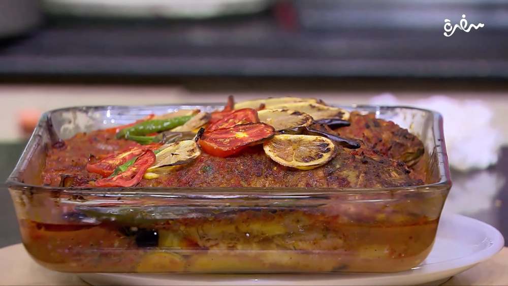 صينية بلطي بالباذنجان والشبت