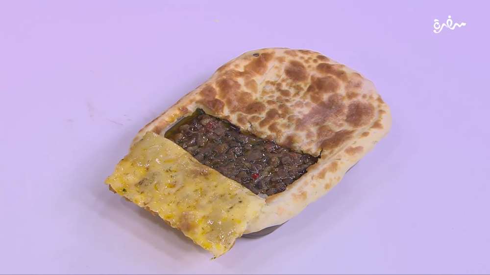 طاجن كبد و كلاوي حار بالعجين