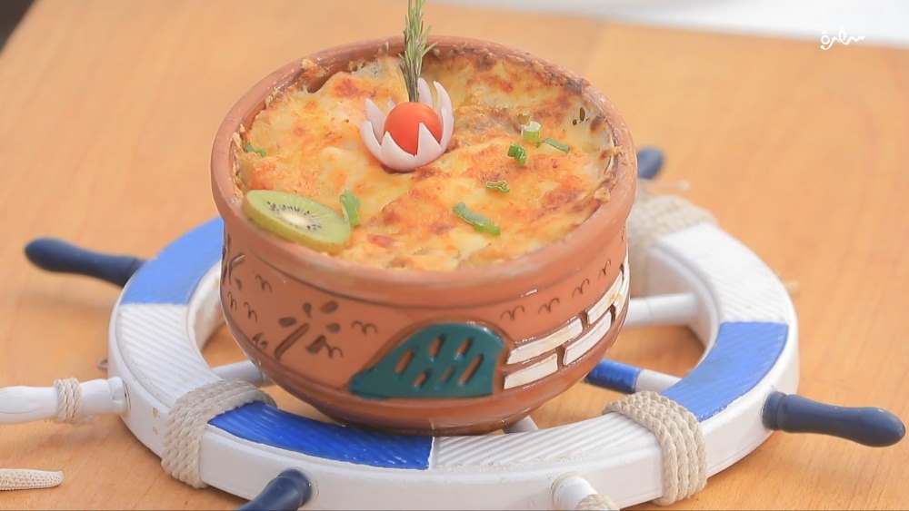 طاجن سمك وجمبري بالصوص الأبيض