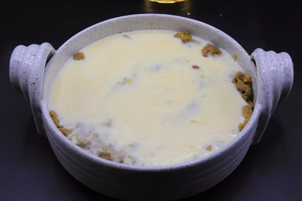 طاجن فول بالبشاميل