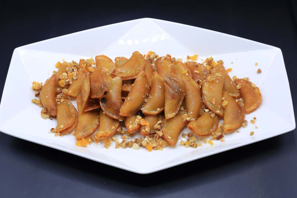 قطايف باللعجوة والسوداني