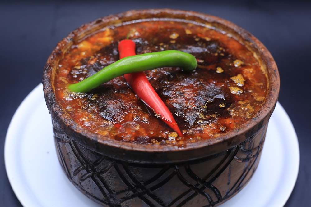 طاجن كوارع بالفاصوليا