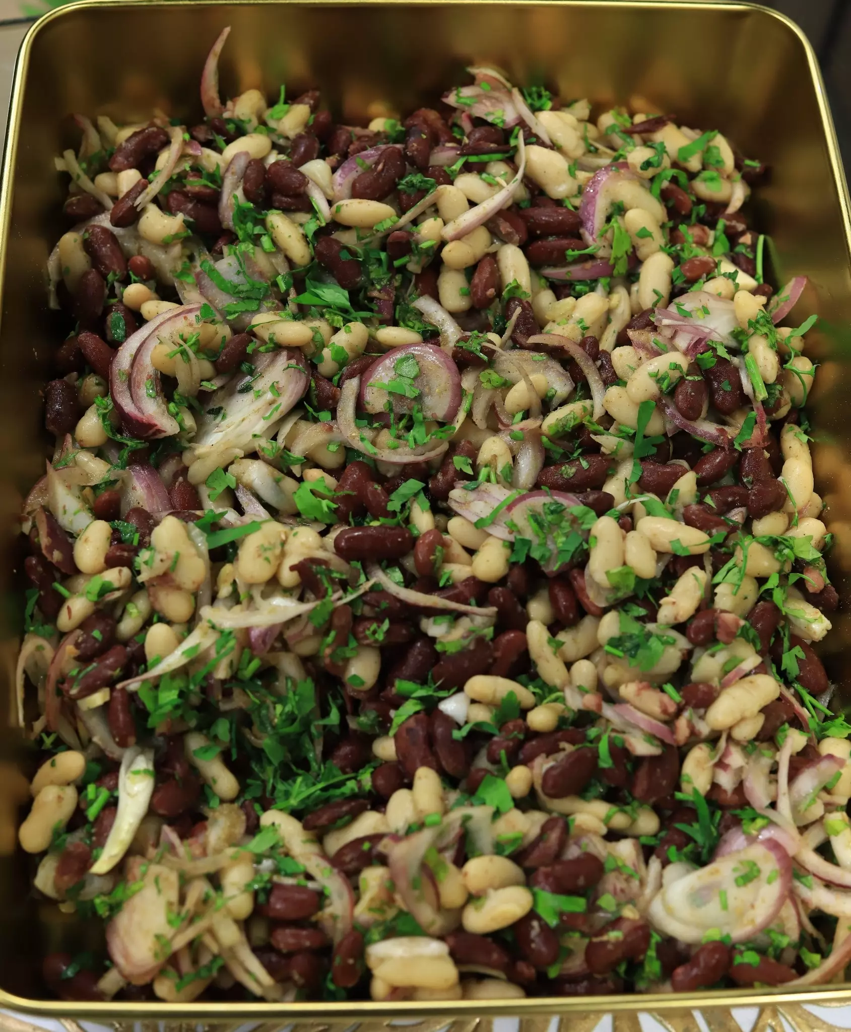 فاصوليا بالبصل الأحمر