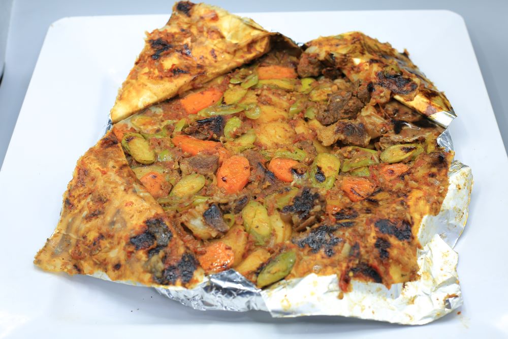 صينية بطاطس باللحمة