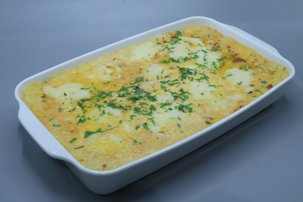 طاجن بطاطس مهروسة بالبسطرمة