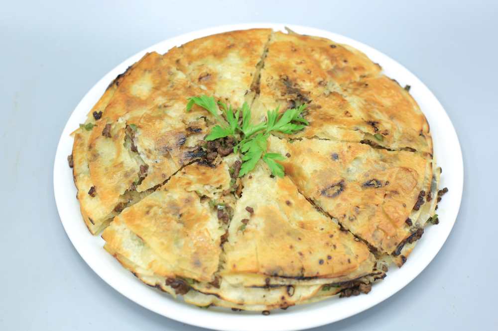 صينية رقاق باللحمة المفرومة