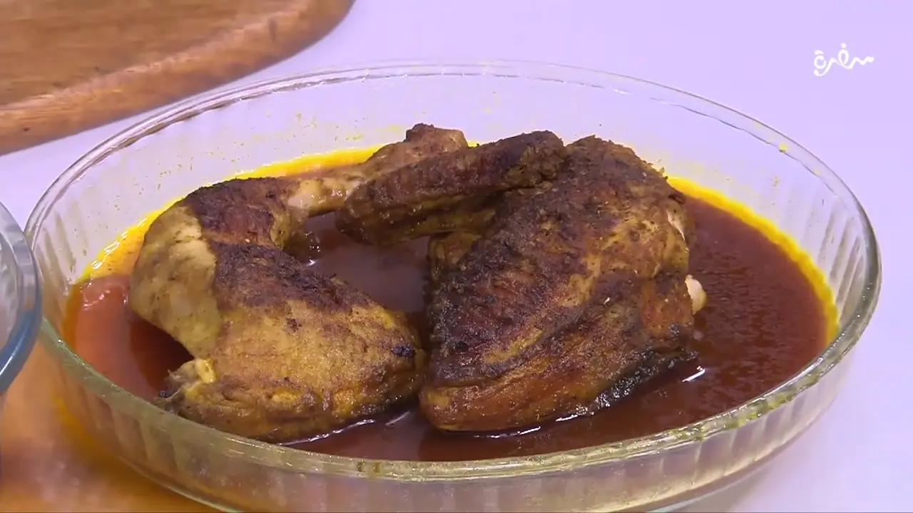 نصف دجاجة مشوية