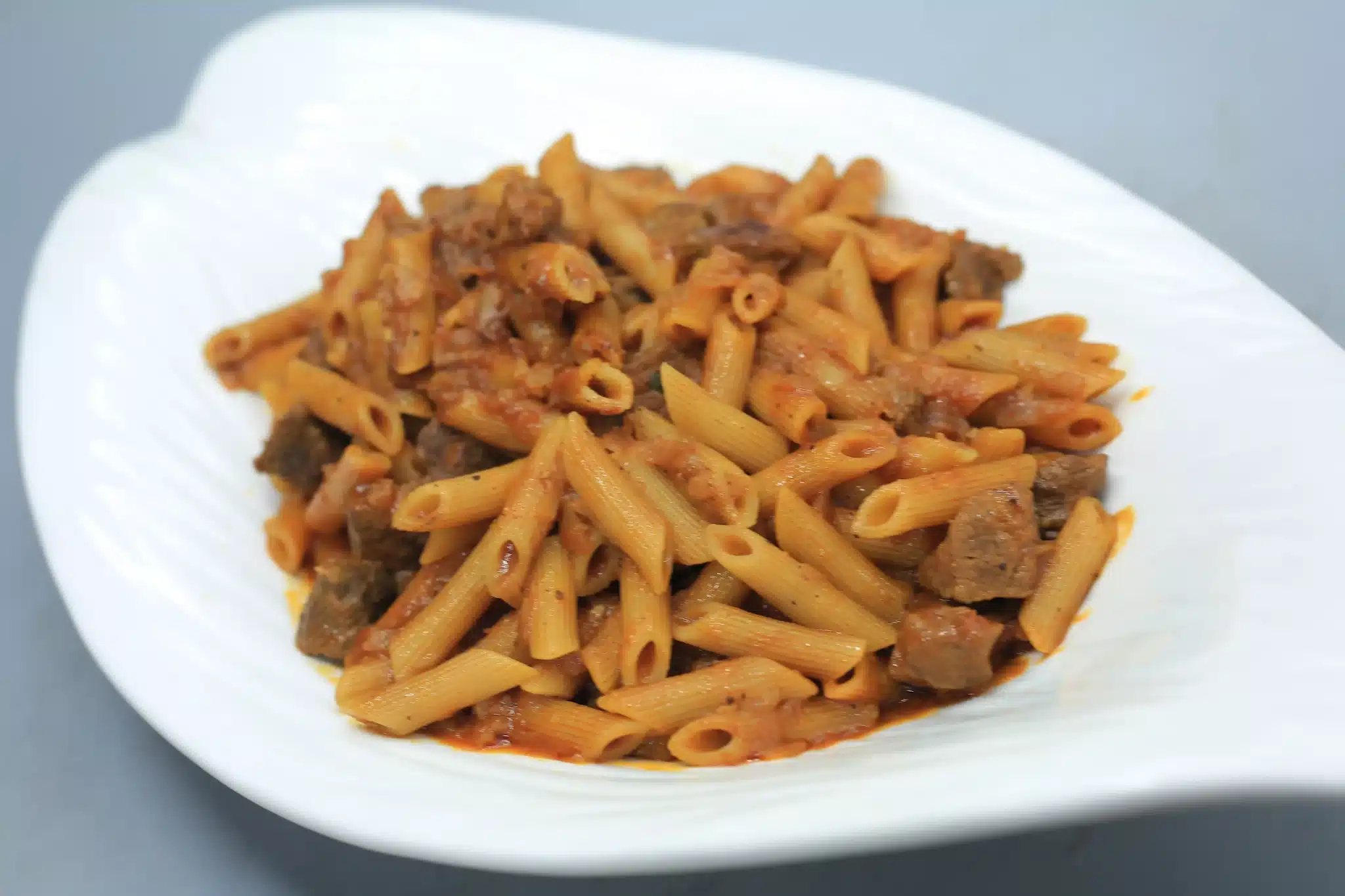 مكرونة مبكبكة باللحمة