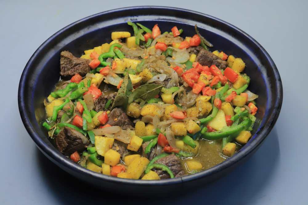 طاجن لحمة بالبصل وقرع العسل