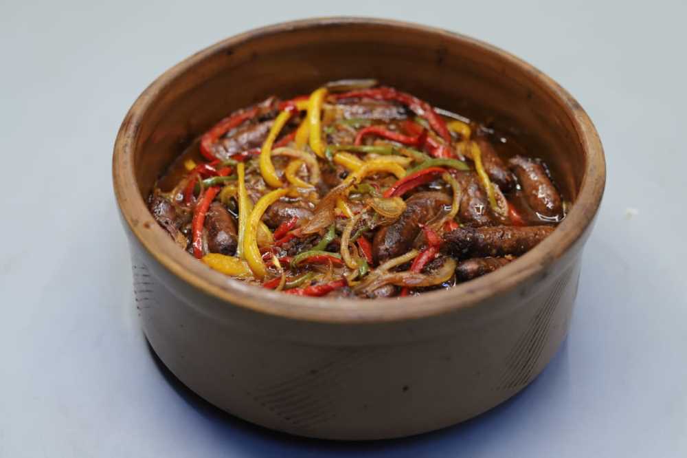 طاجن سجق بدبس الرمان بطريقة توتا