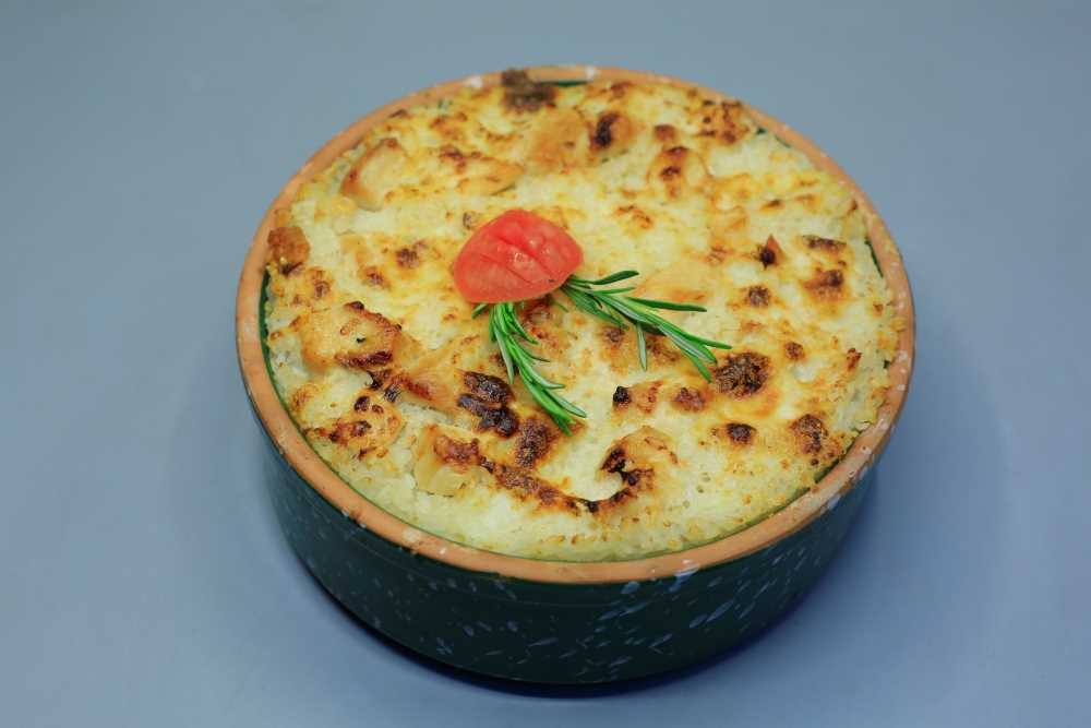 أرز معمر بالدجاج والقشطة