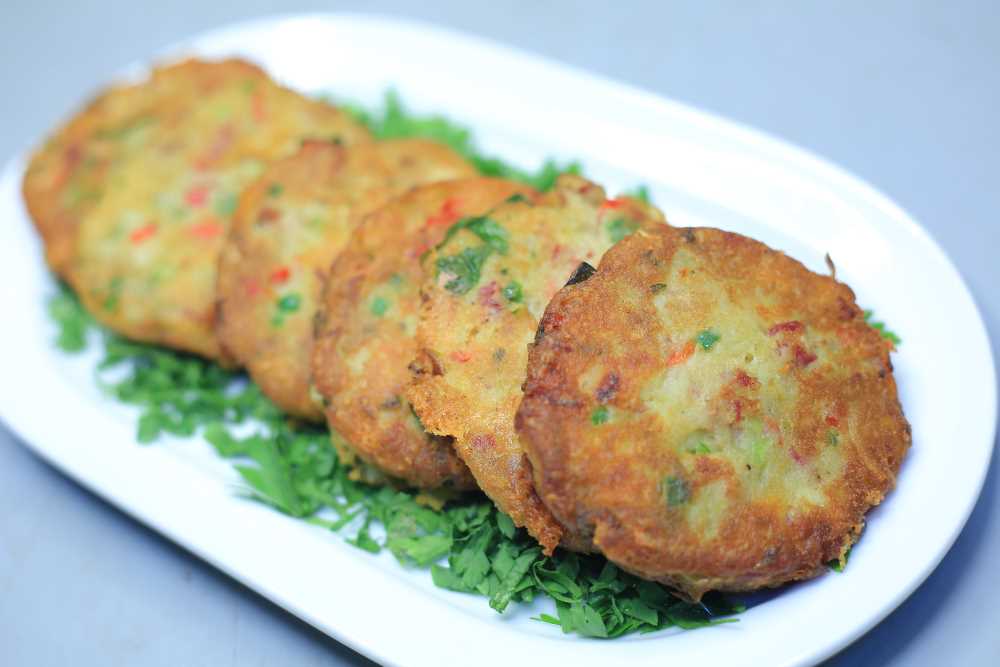 أقراص البطاطس بالبسطرمة